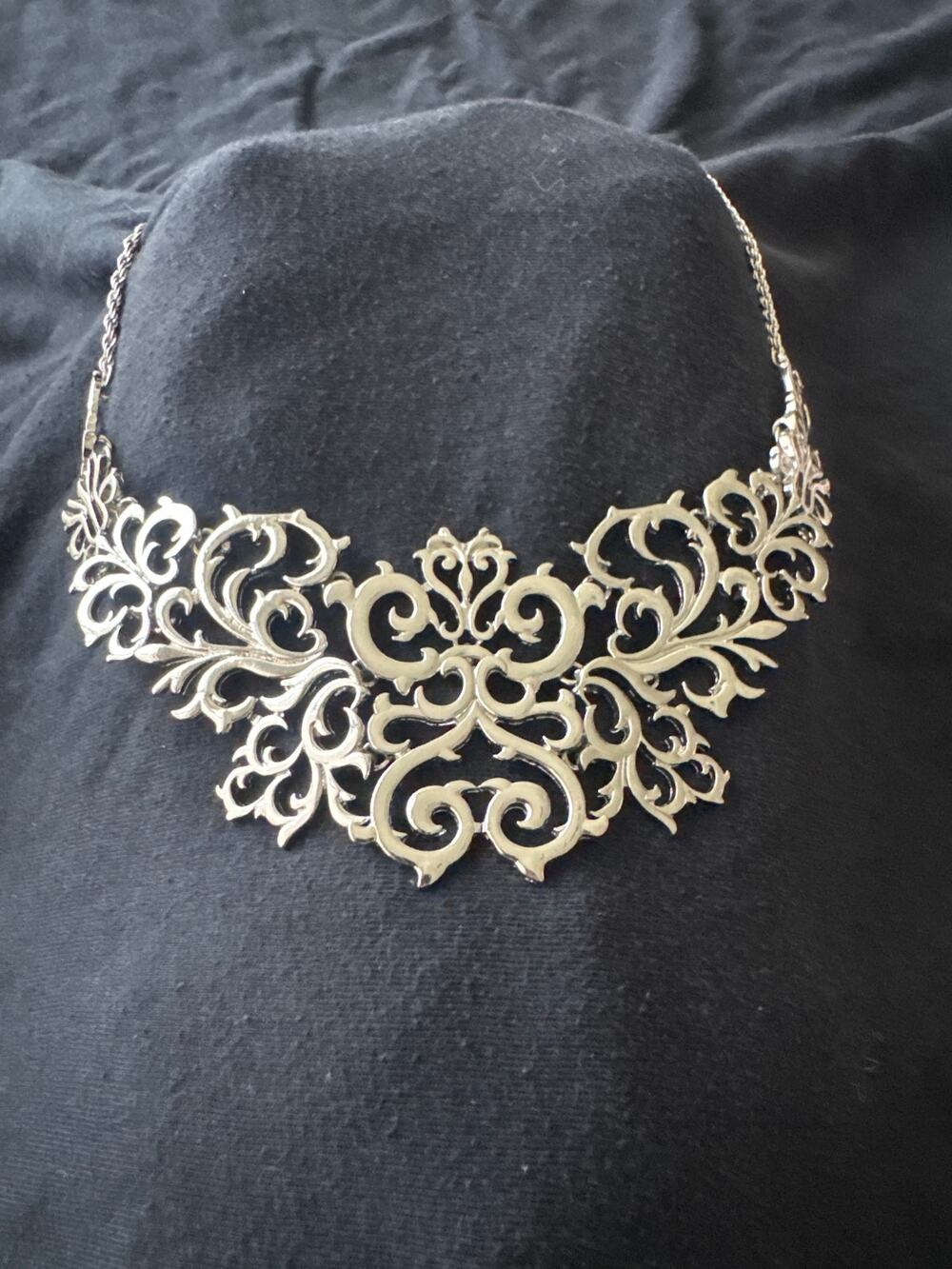 Silver tone bib statement necklace